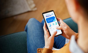 a person using their phone to scan a qr code