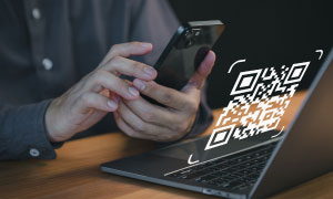 a person using their phone to scan a qr code