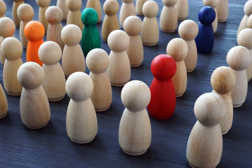 Plain wooden figures with some painted bright colors to stand out.