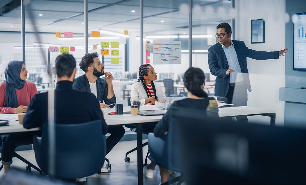Group of people collaborating in office