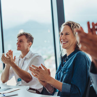 The people at the meeting were appluading