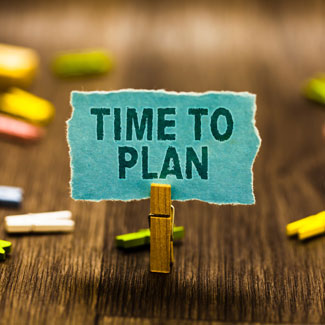 piece of paper saying 'time to plan'