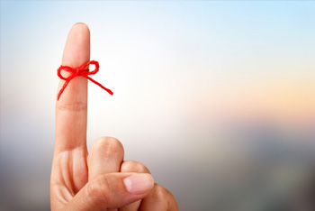 String tied around a finger as a reminder