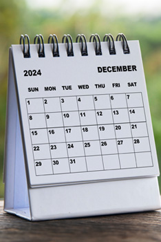 December 2024 Calendar on a table