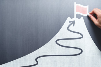 Reaching the top of a mountain