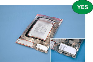 Correct tamper-evident plastic bag correctly labeled with instutition identification.