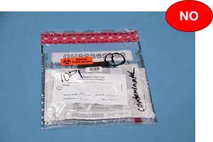 Incorrect example where contaminated currency is not visible inside bag