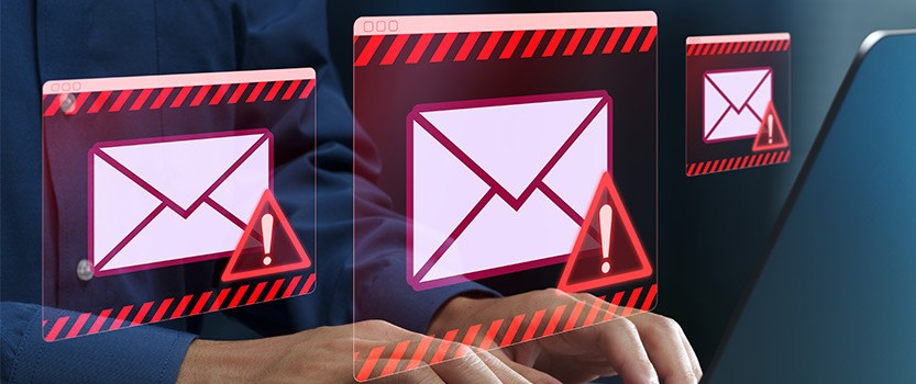 laptop screen warning icons phishing and scam emails