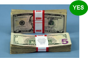 Yes - bundles of cash with a single band of proper color-coding and material